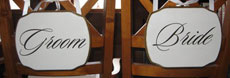 applied image of vinyl wall art quote on wood for wedding chairs